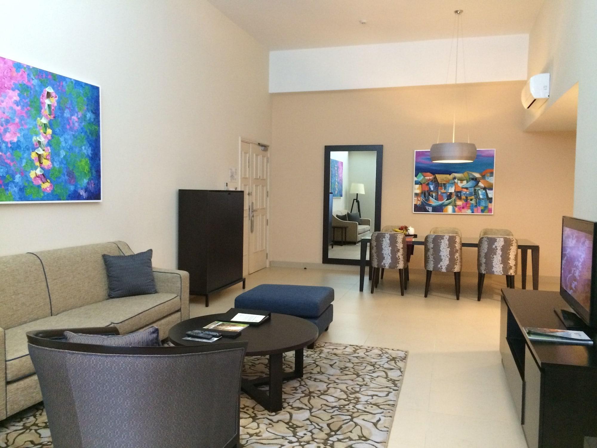 Somerset Cidade de Ho Chi Minh Exterior foto A living room in a typical apartment at the Ritz-Carlton, DIFC