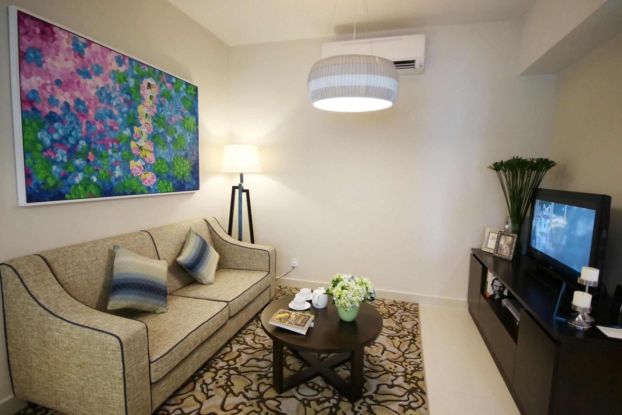 Somerset Cidade de Ho Chi Minh Exterior foto A living room in a condominium