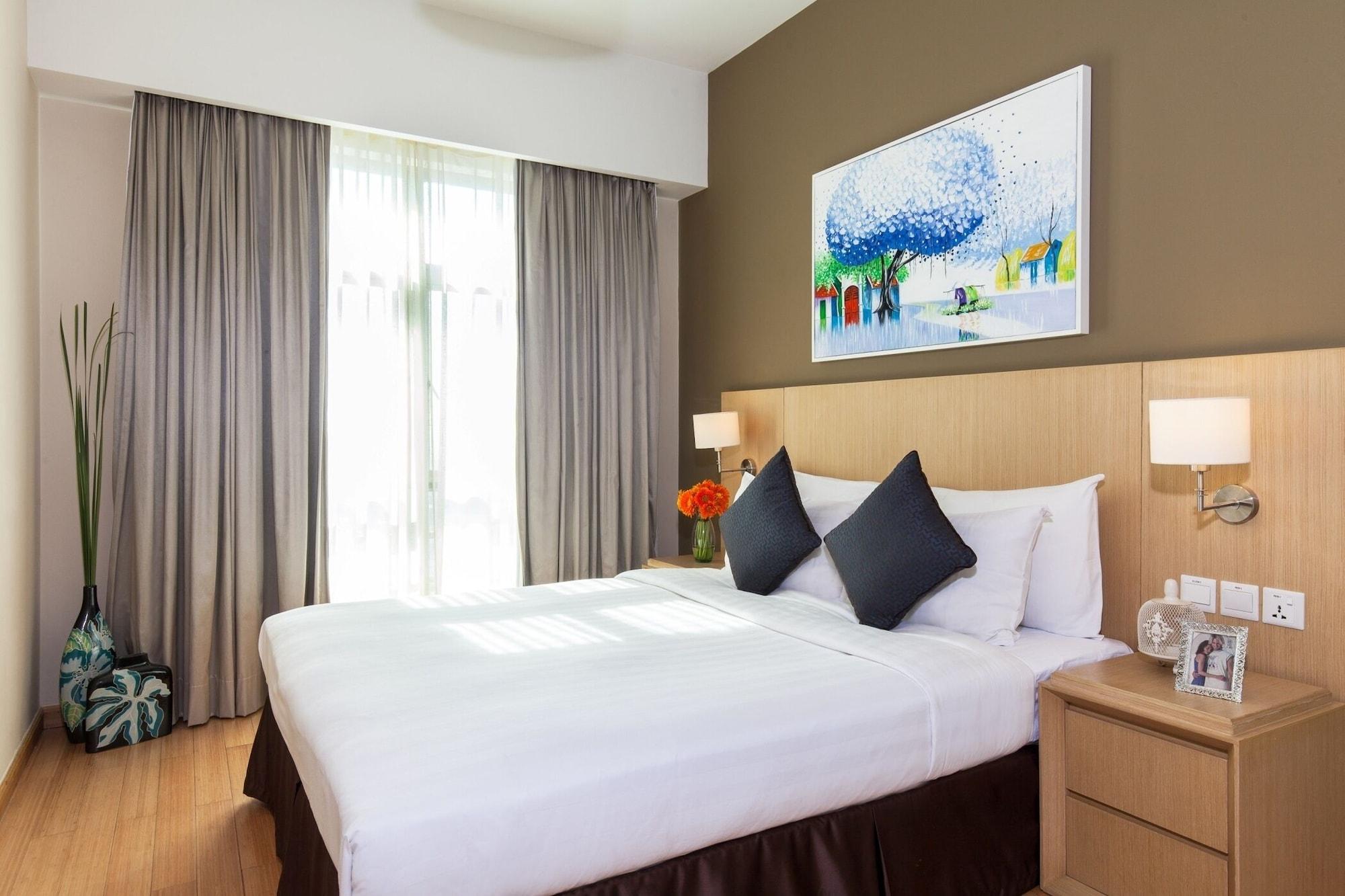 Somerset Cidade de Ho Chi Minh Exterior foto A bedroom at the hotel